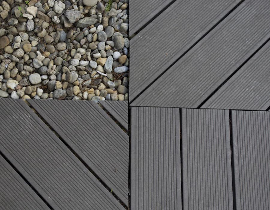 Close-up of grey composite decking boards on a backyard deck