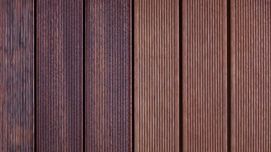 Close-up of grooved brown composite decking boards in varied tones