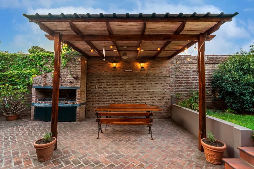 Covered deck structure with a roof, before screening