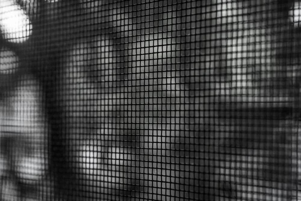 Close-up of porch insect screen mesh weave