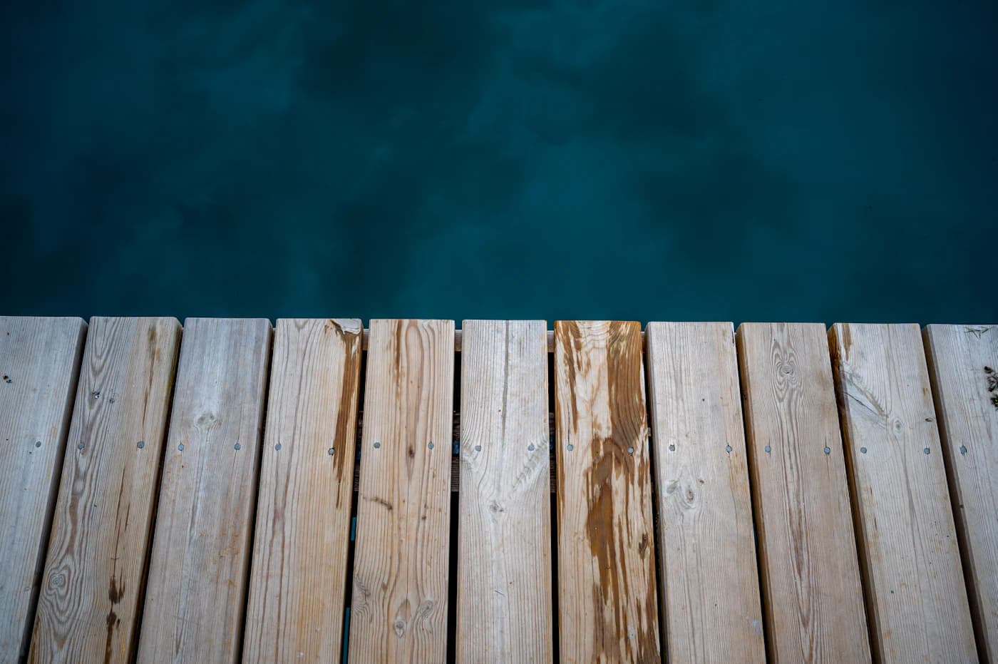 Sunny poolside deck where surface heat matters most